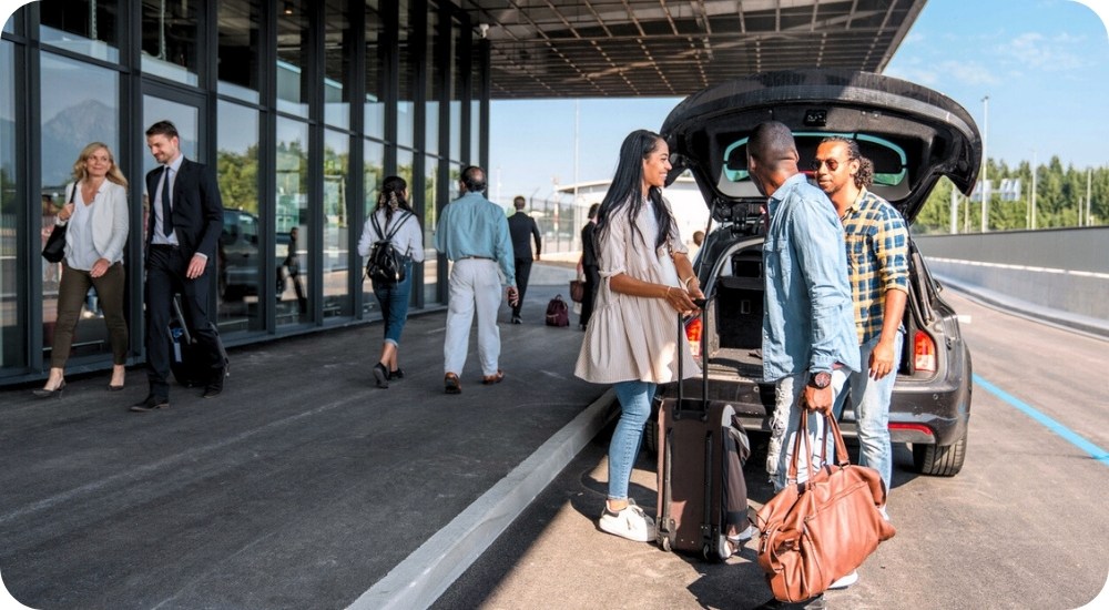 Friends Being Dropped Off at Airport Departure Level