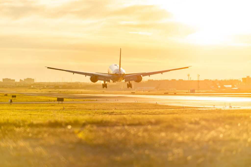 Airplane preparing to land on the runway in Pearson International airport at dusk, Toronto,Canada.