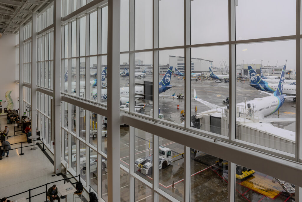 Seattle, Washington - March 13, 2026:  It snowed all day in Seattle causing massive flight delay and cancellation at Sea-Tac Airport, as viewed from mezzanine in North Satallite.  HDR encoded