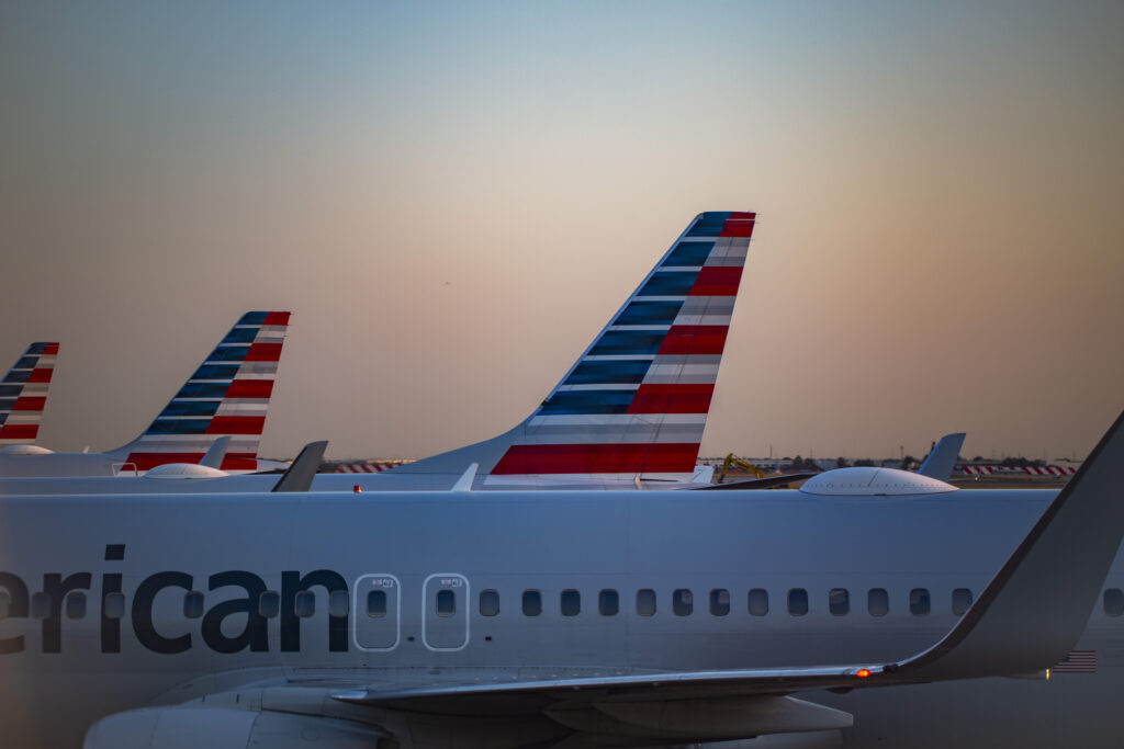 American Airlines tails and fuselage at sunrise at Dallas Fort Worth International Airport in Oct 2024