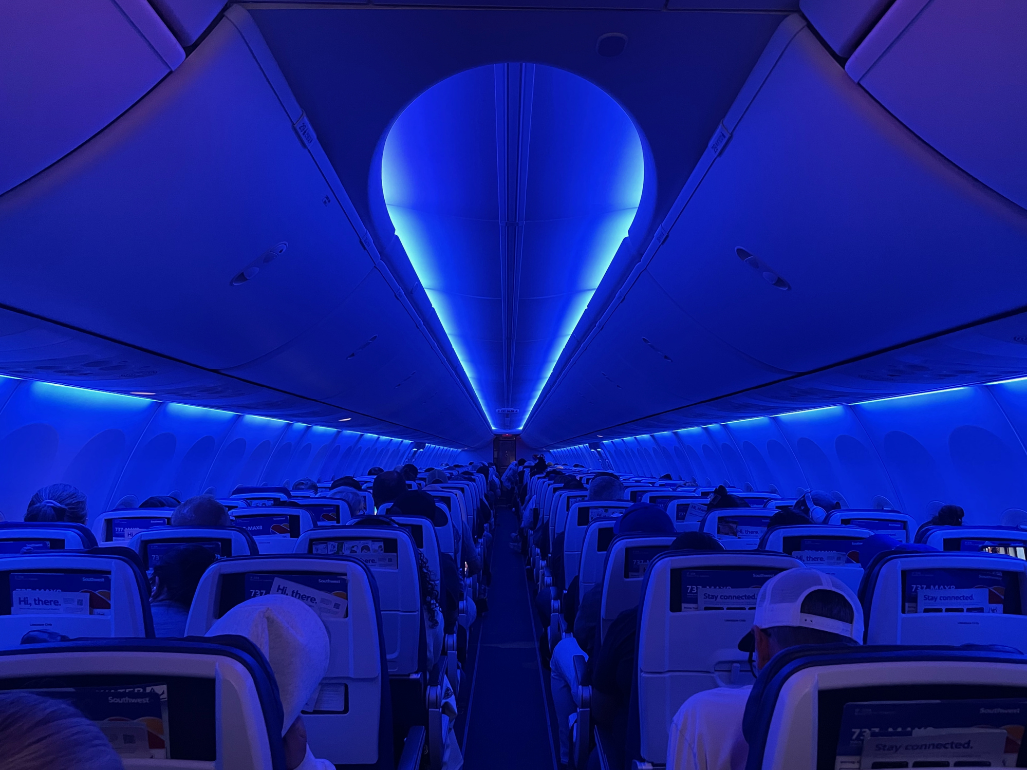 Denver, Colorado, USA - June 7, 2025: Passengers on a Southwest Airlines Boeing 737-MAX8 aircraft settle in during a flight from Denver International Airport (DEN) to Washington Dulles International Airport (IAD) in Virginia.