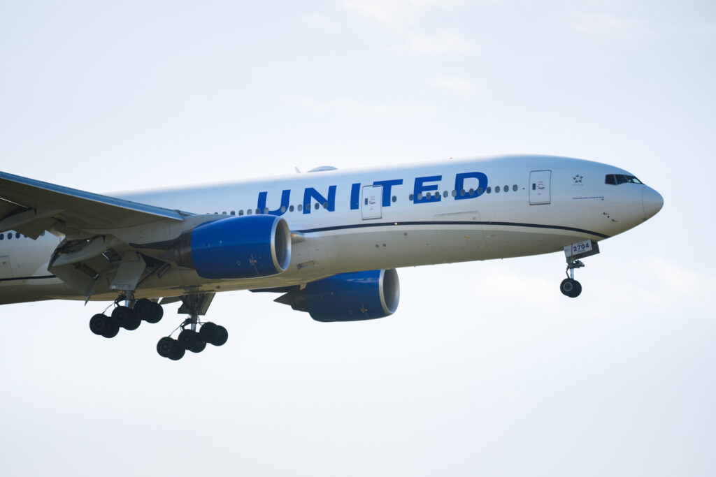 United Airlines Boeing 777 flying to  Auckland International Airport.