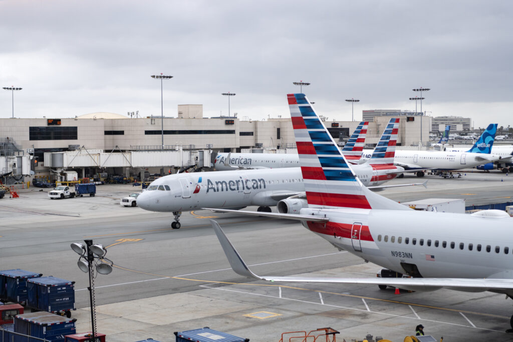 Miami, Florida, USA - April 29, 2025: American airline. American airlines group plane departure in airport. Airport terminal. Plane arrival American airline. Departure and arrival airport terminal.