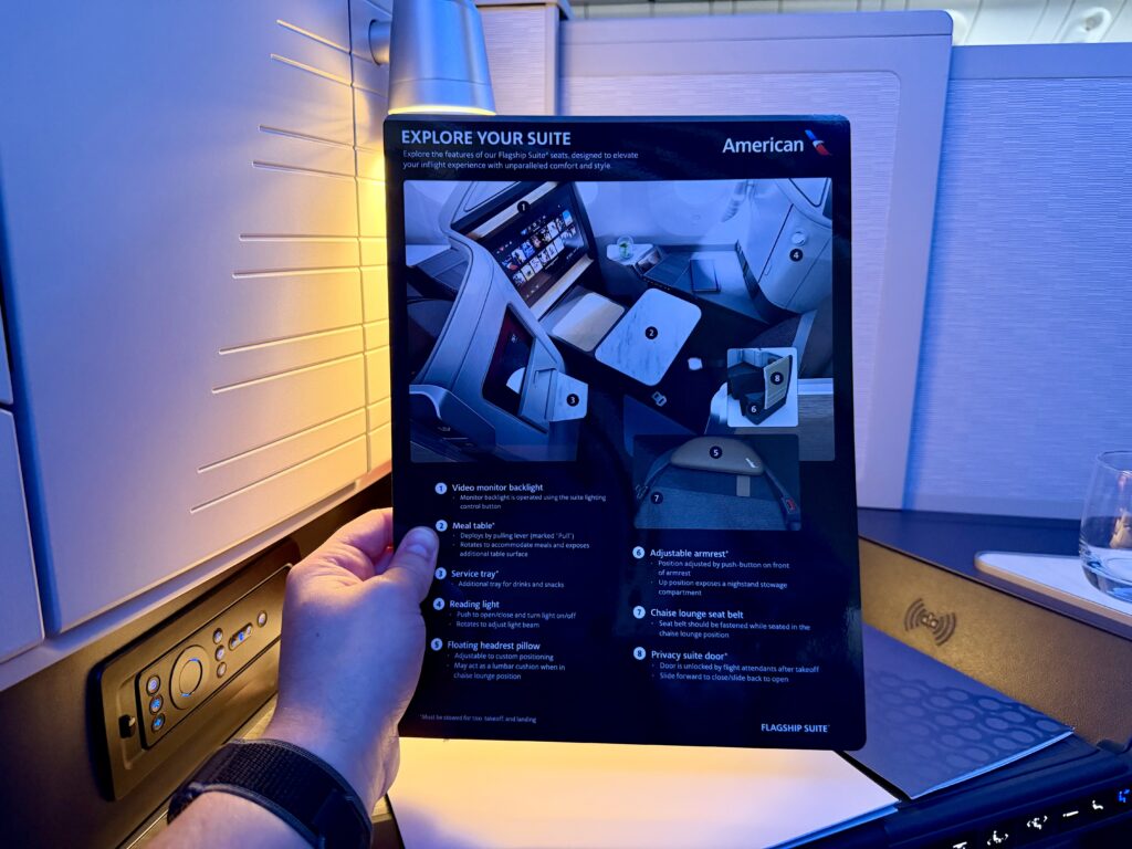Business class pamphlet on the retrofitted AA 777-300ER.