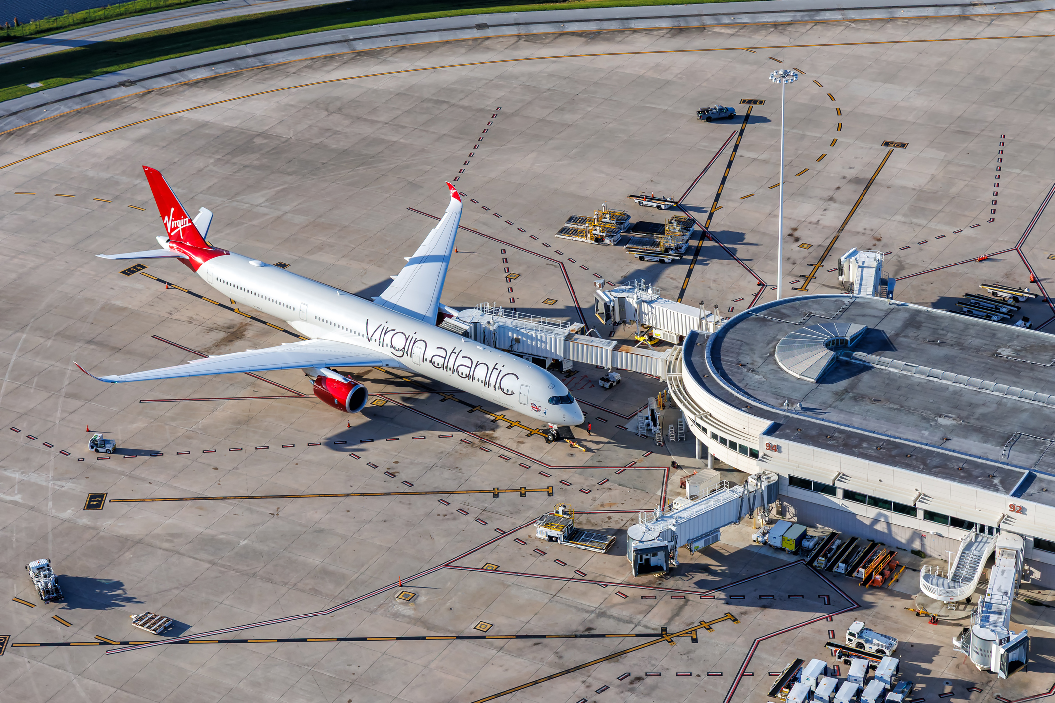 Aerial view photo of Virgin Atlantic Airbus A350-1000 airplane at Orlando Airport, United States.